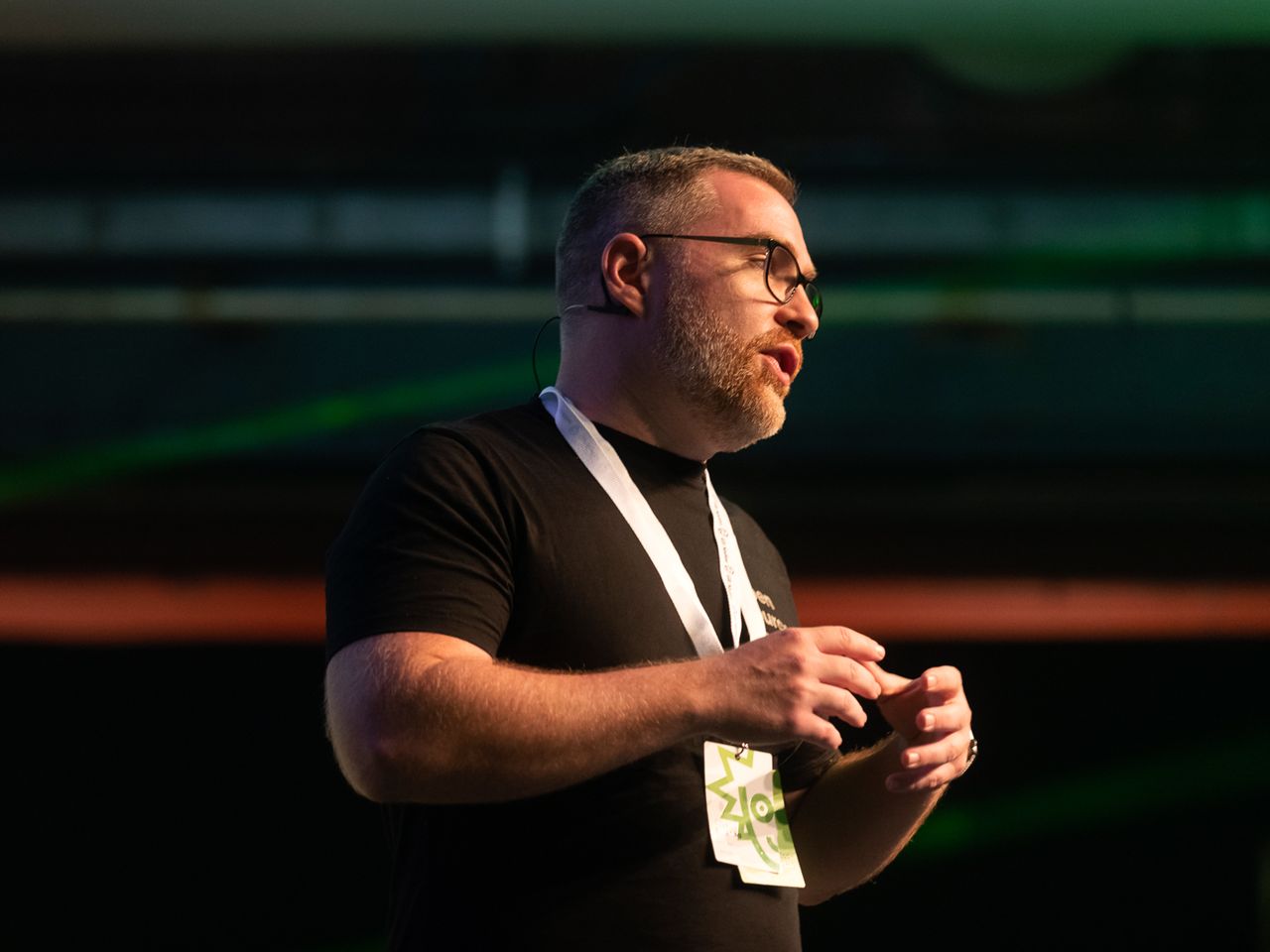 Cody speaking on stage at react summit